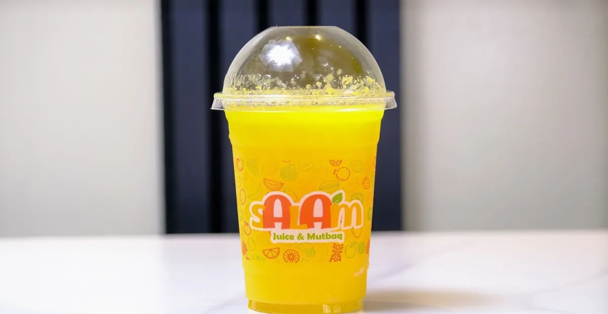 Fresh mango juice in a Salam cup